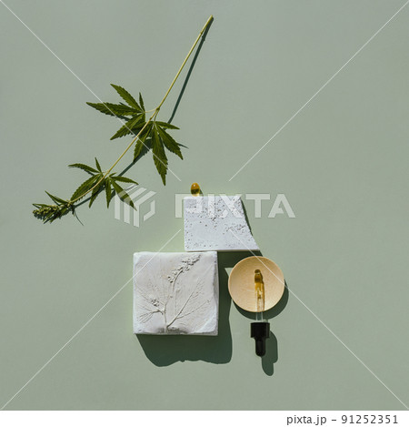 Podium and hemp leaf for the presentation of products with CBD oil and cannabis 91252351