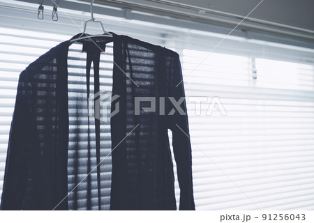 黒色のカーディガン 黒色のカーディガン 91256043