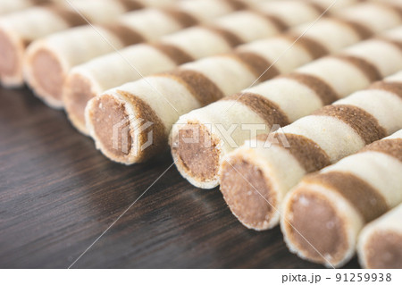 Wafer rolls background. An image of a flat lay texture. Wafer rolls background. An image of a flat lay texture. 91259938