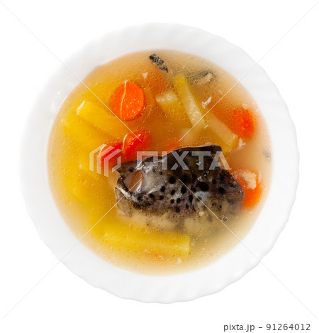 Plate of salmon head fish stock with potatoes and carrot Plate of salmon head fish stock with potatoes and carrot 91264012