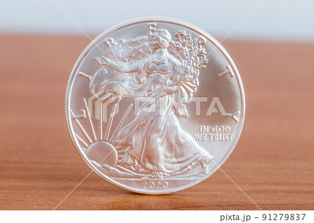 1oz fine silver one dollar (Bullion Coin). Side with Walking Liberty and United States' official motto 91279837