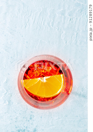Aperol cocktail with a fresh orange slice, Italian summer cold drink 91289179