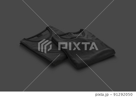 Blank black folded square t-shirt mockup pair, dark background 91292050