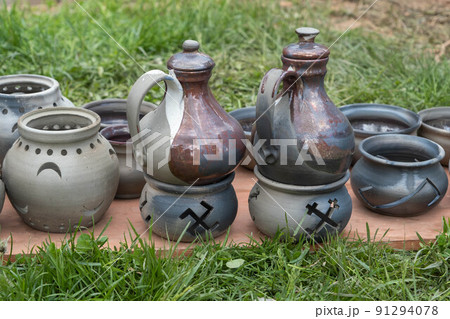 fired earthenware removed from the kiln. Mugs, pots, plates and everything else beautiful and useful. Latvian national cultural heritage 91294078