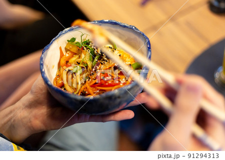 Asian food bowl bowl with shrimp, vegetables and rice noodles 91294313