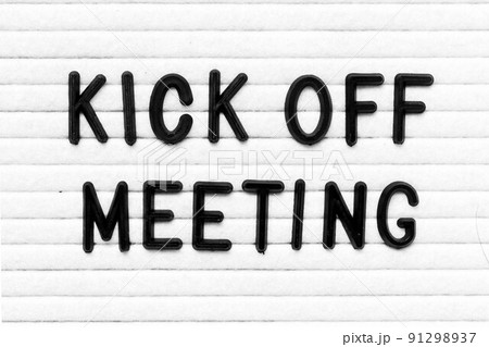 Black color letter in word kick off meeting on white felt board background 91298937