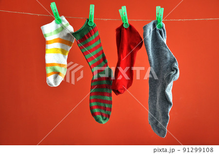 Socks hanging on a rope 91299108