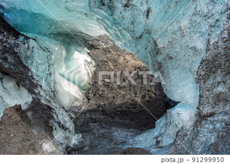 Ice cave on a glacier in Iceland 91299950