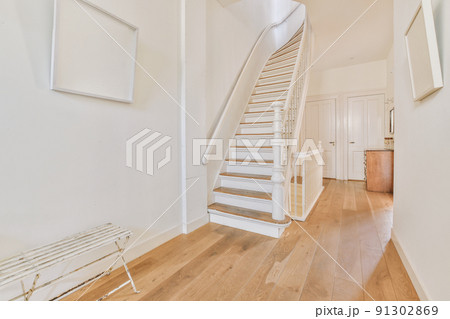 Luxury staircase hall of special design in an elegant house Luxury staircase hall of special design in an elegant house 91302869