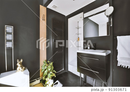 Interior of contemporary bathroom with shower and sink in minimal style in flat 91303671