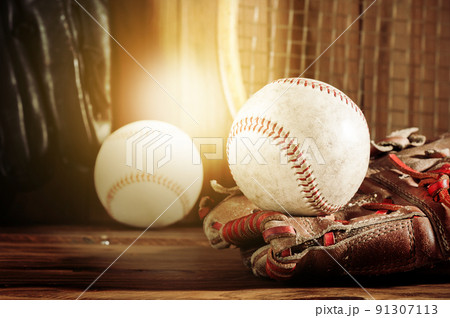 baseball glove and baseball 91307113
