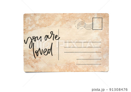You are loved. Lettering on a vintage postcard. Isolated on white You are loved. Lettering on a vintage postcard. Isolated on white 91308476
