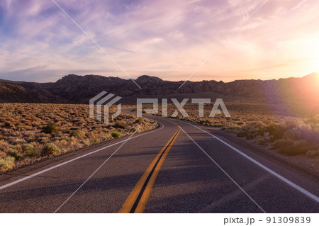 Scenic highway in the mountain landscape. Sunset Sky. 91309839