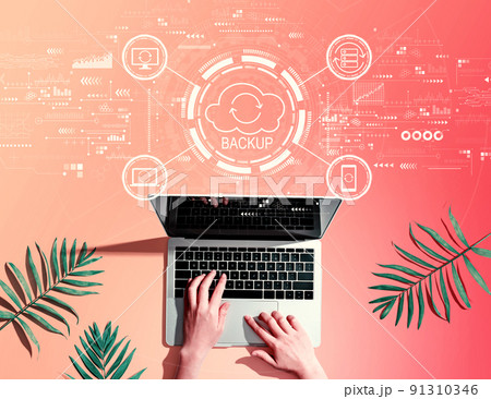 Backup concept with person using a laptop 91310346