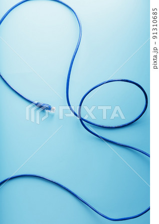 Blue UTP Internet Cable Isolated on a blue background Ethernet Cord 91310685