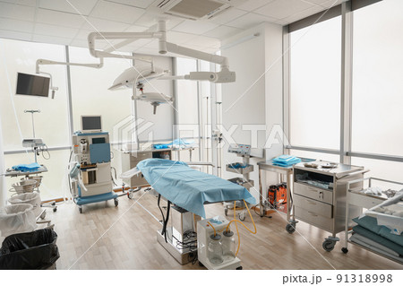 Interior of operation room with different medical equipment ready for surgery 91318998