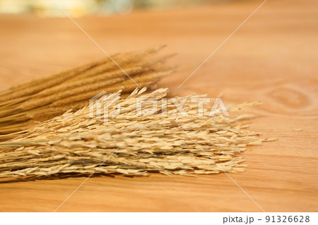Close up wheat on wood table. Close up wheat on wood table. 91326628