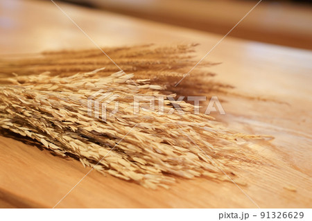 Close up wheat on wood table. Close up wheat on wood table. 91326629