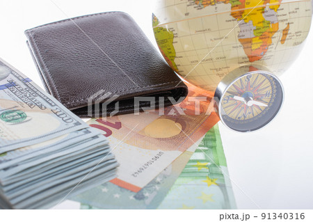 Compass, box, wallet and Euro banknotes as business finance concept 91340316