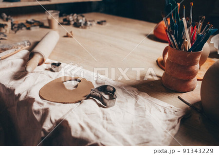 Pottery creative mess on the table. Pottery creative mess on the table. 91343229