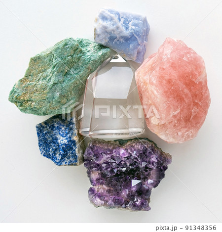 Closeup of crystals and gemstones on a white background Closeup of crystals and gemstones on a white background 91348356