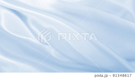 Smooth elegant blue silk or satin luxury cloth texture as abstract background. Luxurious background design 91348617
