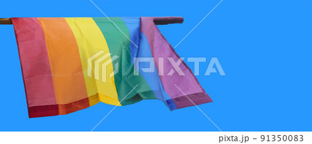 Realistic vector pride rainbow lgbt gay flag being waved on sky background 91350083