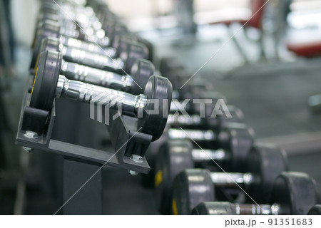 Dumbbell, barbell in the gym with copy space . 91351683