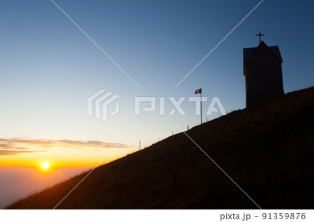 Dawn at the little church, mount Grappa landscape, Italy 91359876