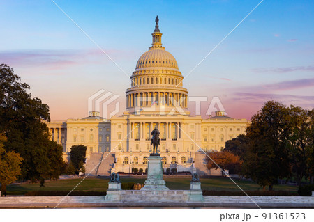The United States Capitol building at Washington D.C. in the evening. 91361523