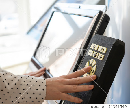 A woman uses a voting device for blind and visually impaired citizens.  91361549