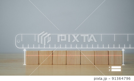 Measurement concept. This image shows how to use measuring application. Find size of wood block that arranged in horizontal. Measurement concept. This image shows how to use measuring application. Find size of wood block that arranged in horizontal. 91364796