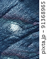 布。糸と糸との間の溢れる光、変化する色彩。背景イメージ素材 91368965