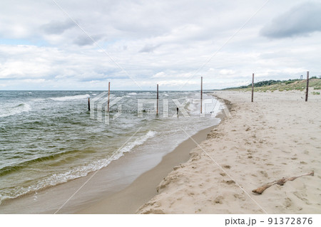 Polish border fence with Russian Federation in Piaski, Poland. 91372876