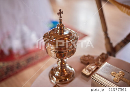 baby christening. Ceremony of a christening in Christian church. baptismal. 91377561
