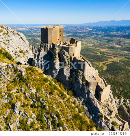 View of medieval Chateau de Queribus castle. Aude department. France View of medieval Chateau de Queribus castle. Aude department. France 91384316