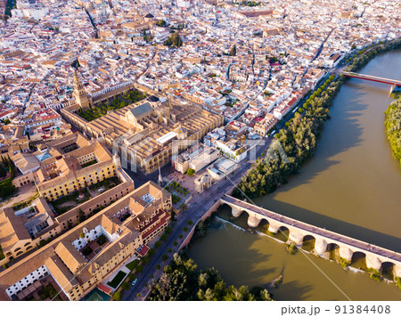 Aerial view of Cordoba with Roman Bridge and Mosque-Cathedral 91384408