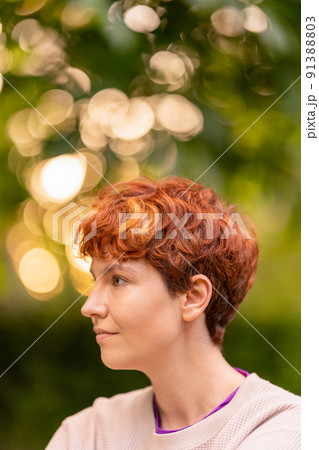 Calm non binary person on summer day in nature 91388803