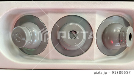 Selective focus on the air vent inside a commercial airplane general seating area. Selective focus on the air vent inside a commercial airplane general seating area. 91389657