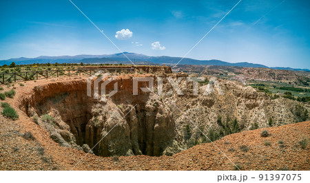 Viewpoint to spectacular formations with unrecognizable tourist Viewpoint to spectacular formations with unrecognizable tourist 91397075