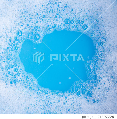 Detergent foam bubble, blue background. Detergent foam bubble, blue background. 91397720