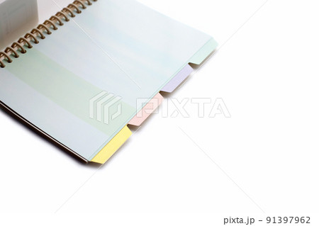 Open notebook on white background 91397962