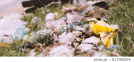 BANNER Real nature life climate crisis, land near sea park pollution. Dirty sand beach, throwing outdoor plastic litter waste, need environmental protection. Problem of garbage caused by man made 91398604