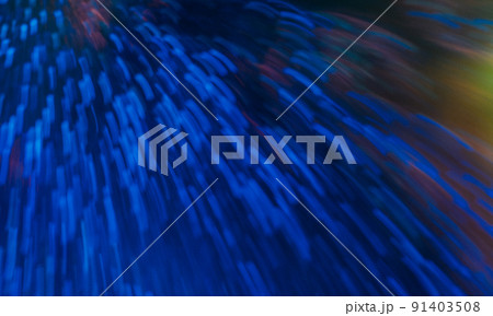 Defocused neon flare. Color light burst. Night firework glare. Blur laser navy blue pink yellow color glowing rays motion on dark black abstract background. 91403508