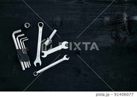 Tools for work or repair auto on black wooden background. Top view 91406077