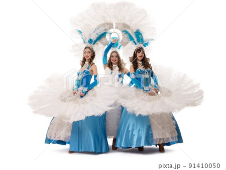 Woman in dance dresses with feather fans 91410050