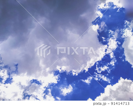 Huge white fluffys clouds sky background with blue sky background Huge white fluffys clouds sky background with blue sky background 91414713