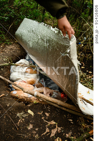 Storage of bread and food in the pit by the Ukrainian military, 91416806