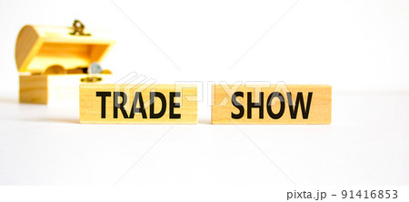 Trade show symbol. Wooden blocks with concept words Trade show on beautiful white background. Wooden chest with coins. Business economic financial trade show concept. Copy space. Trade show symbol. Wooden blocks with concept words Trade show on beautiful white background. Wooden chest with coins. Business economic financial trade show concept. Copy space. 91416853