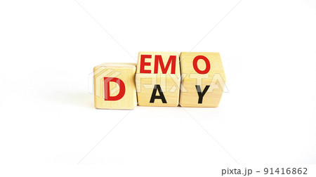 Demo day symbol. Concept words Demo day on wooden cubes. Beautiful white table white background. Business and demo day concept. Copy space. 91416862